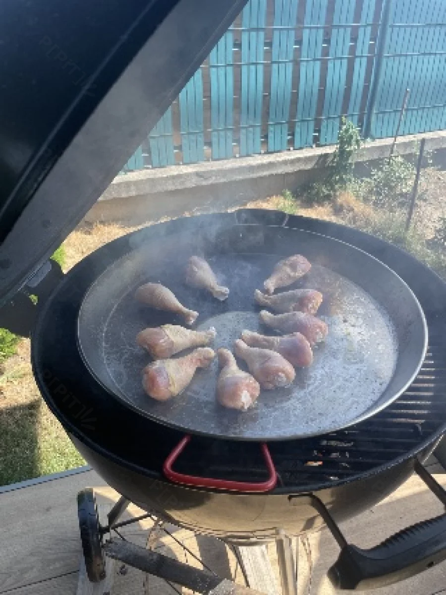 Pilons de poulet en cours de cuisson